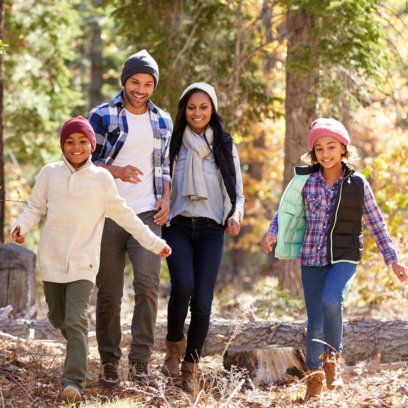 family walking through woods