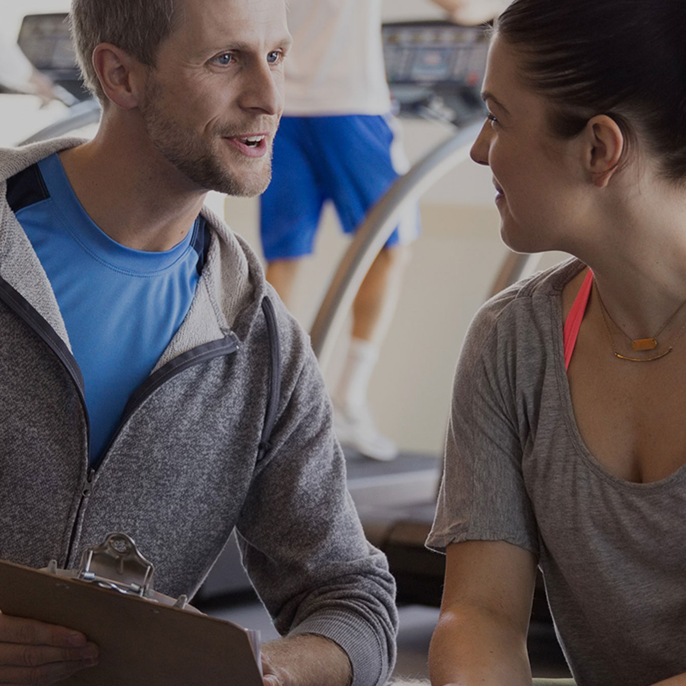 woman with personal trainer